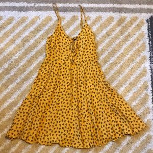 Mustard yellow sun dress with black rose print